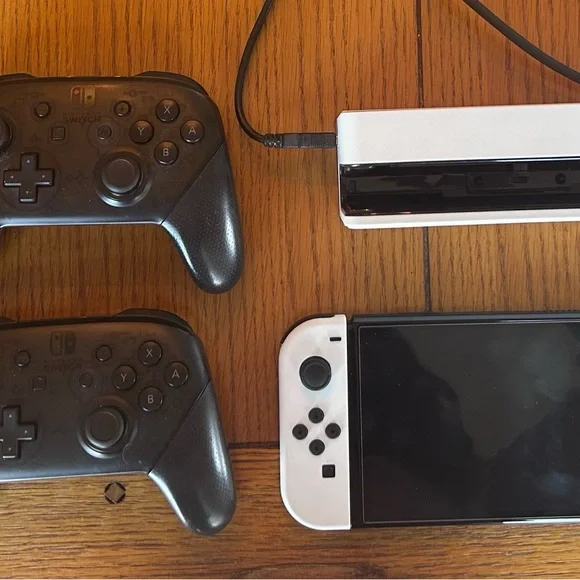 Nintendo Switch OLED with Super Smash Brothers, pro controllers 🎉 - Picture 3 of 6